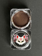 Nekoyanin Mocha brown water-activated graphic liner displayed on a white background, showing the eyeliner's color and packaging.