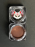 Nekoyanin 38 Chocolate Brown Water Activated Graphic Liner, close-up showing smooth application and vibrant color on skin.