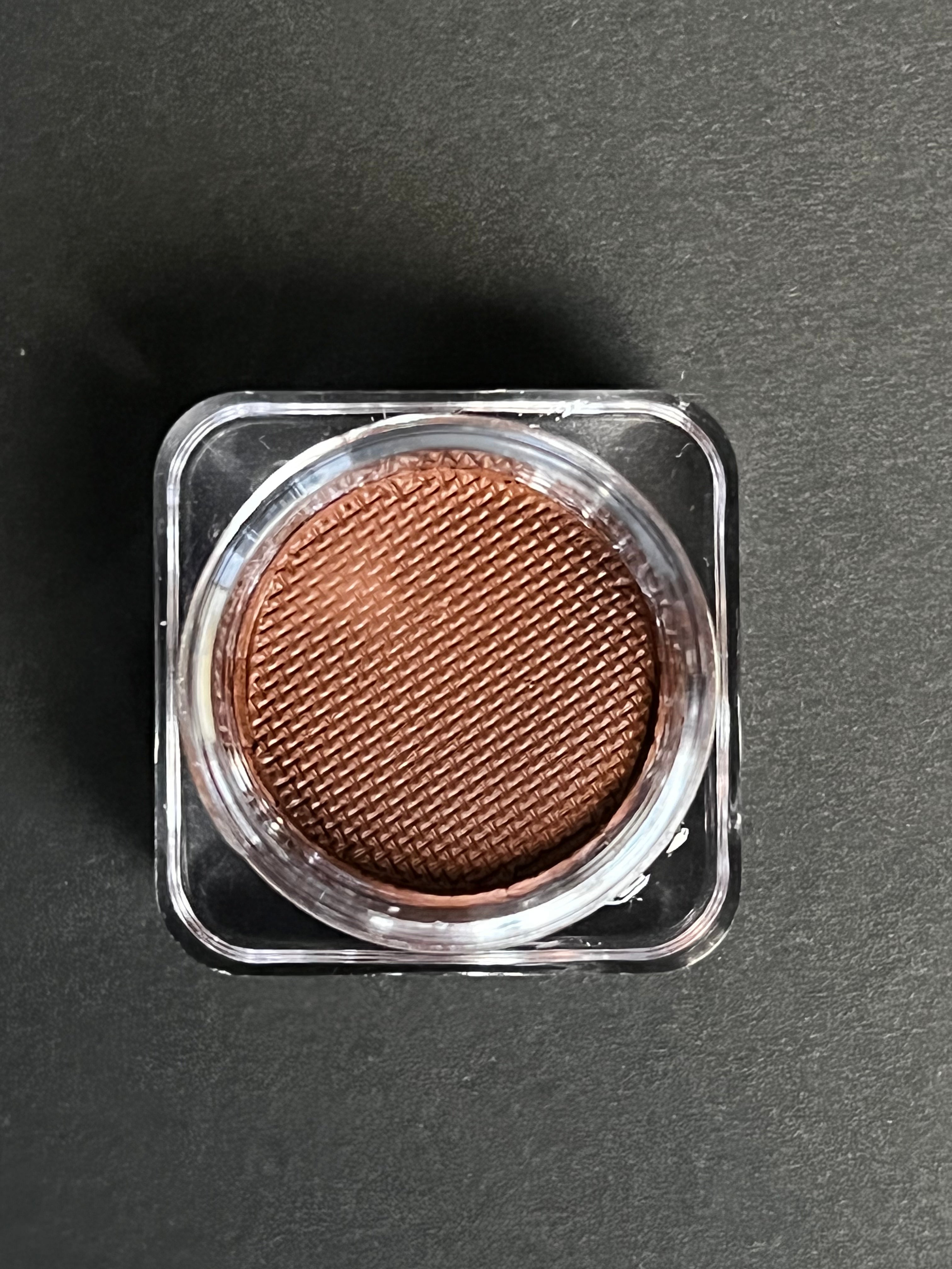 Nekoyanin 38 Chocolate Brown Water Activated Graphic Liner with a sleek, dark brown finish and vibrant graphic design on the packaging.