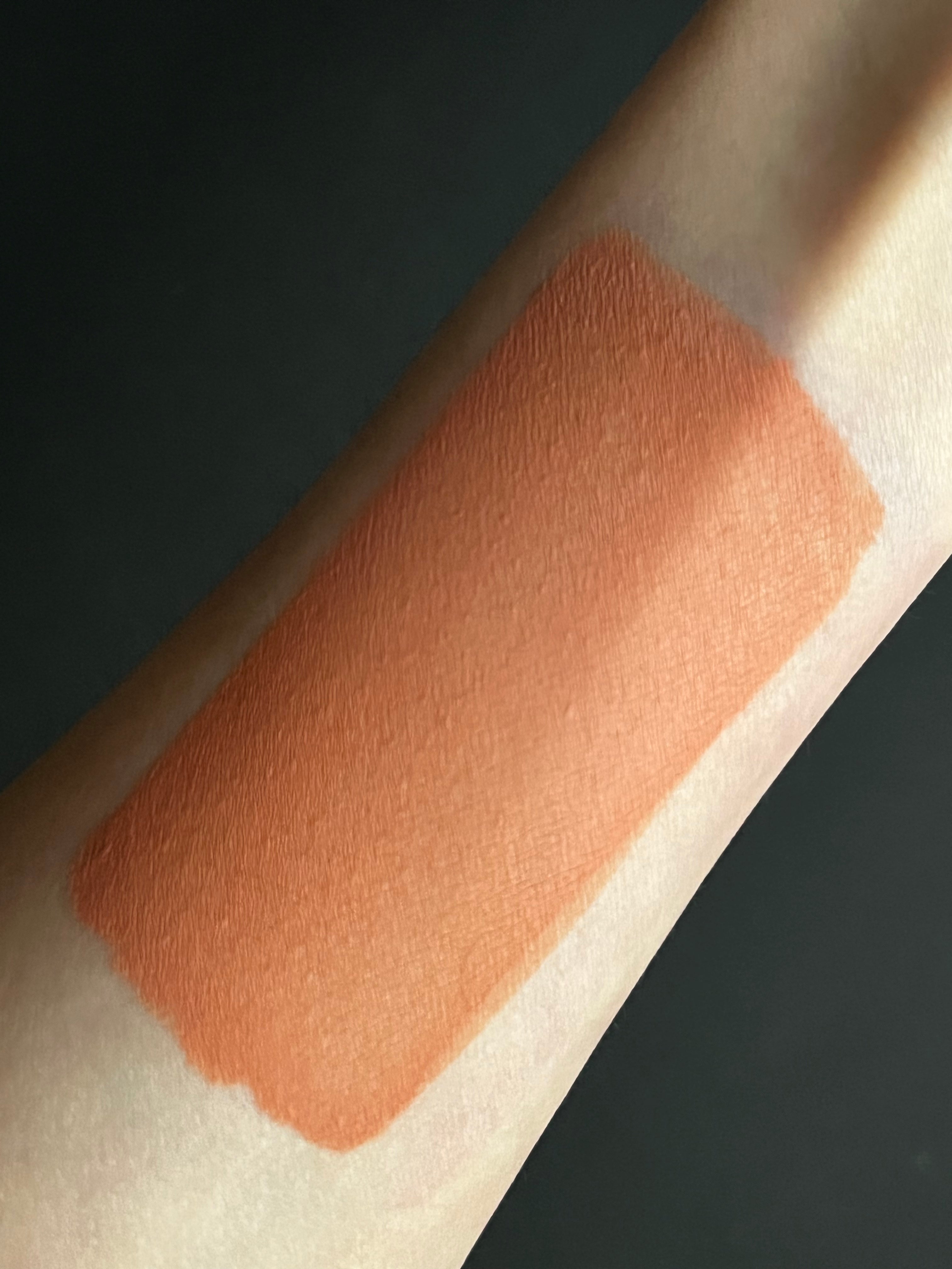 Brown water-activated graphic eyeliner in Sandy shade by Nekoyanin, shown in a close-up image highlighting its design.