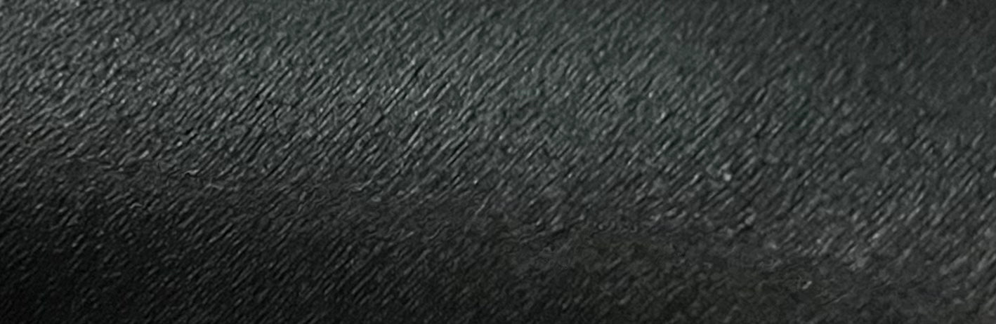 Nekoyanin 41 Raven black water-activated graphic liner, showcasing bold black eyeliner with artistic design on a model's eye.
