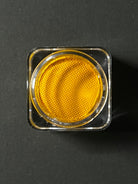 Yellow water-activated graphic liner from Nekoyanin, showcasing the vibrant Cadmium color for bold eye makeup looks.