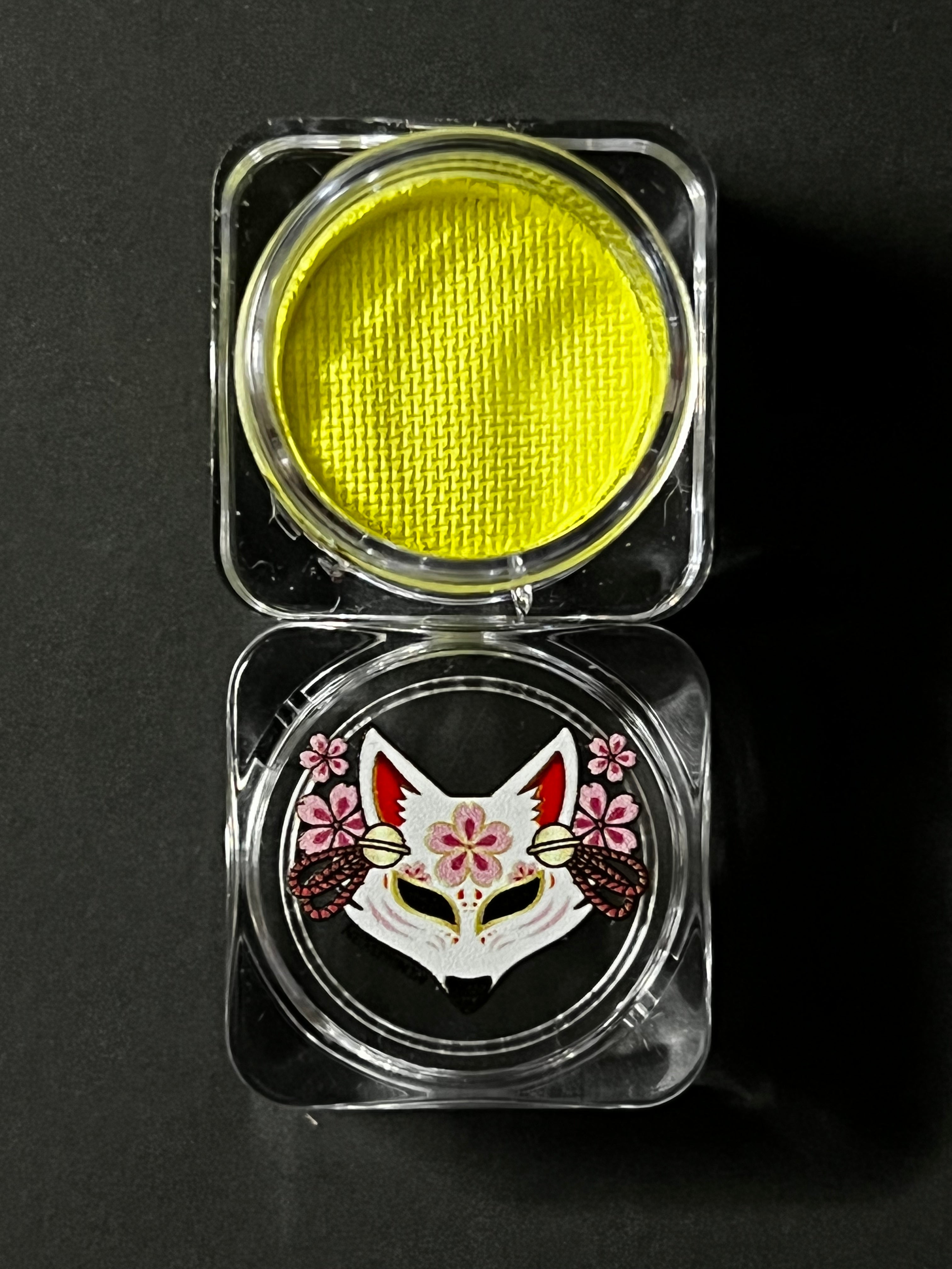 Nekoyanin 44 Chartreuse Yellow Water Activated Graphic Liner, close-up of vibrant, water-activated eye makeup liner with graphic design