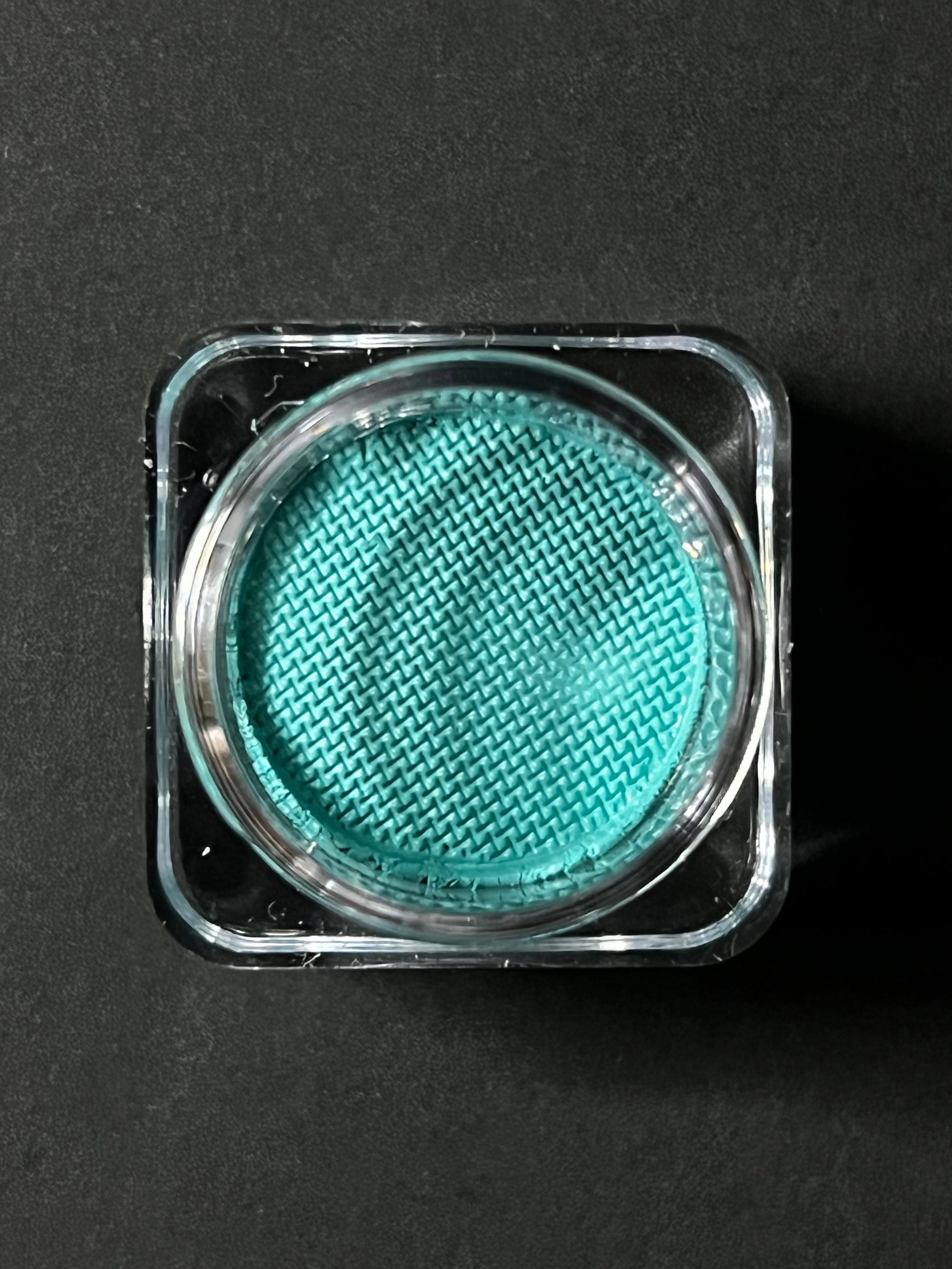 Nekoyanin teal blue water-activated graphic eyeliner pen with sleek design and vibrant color for bold eye looks