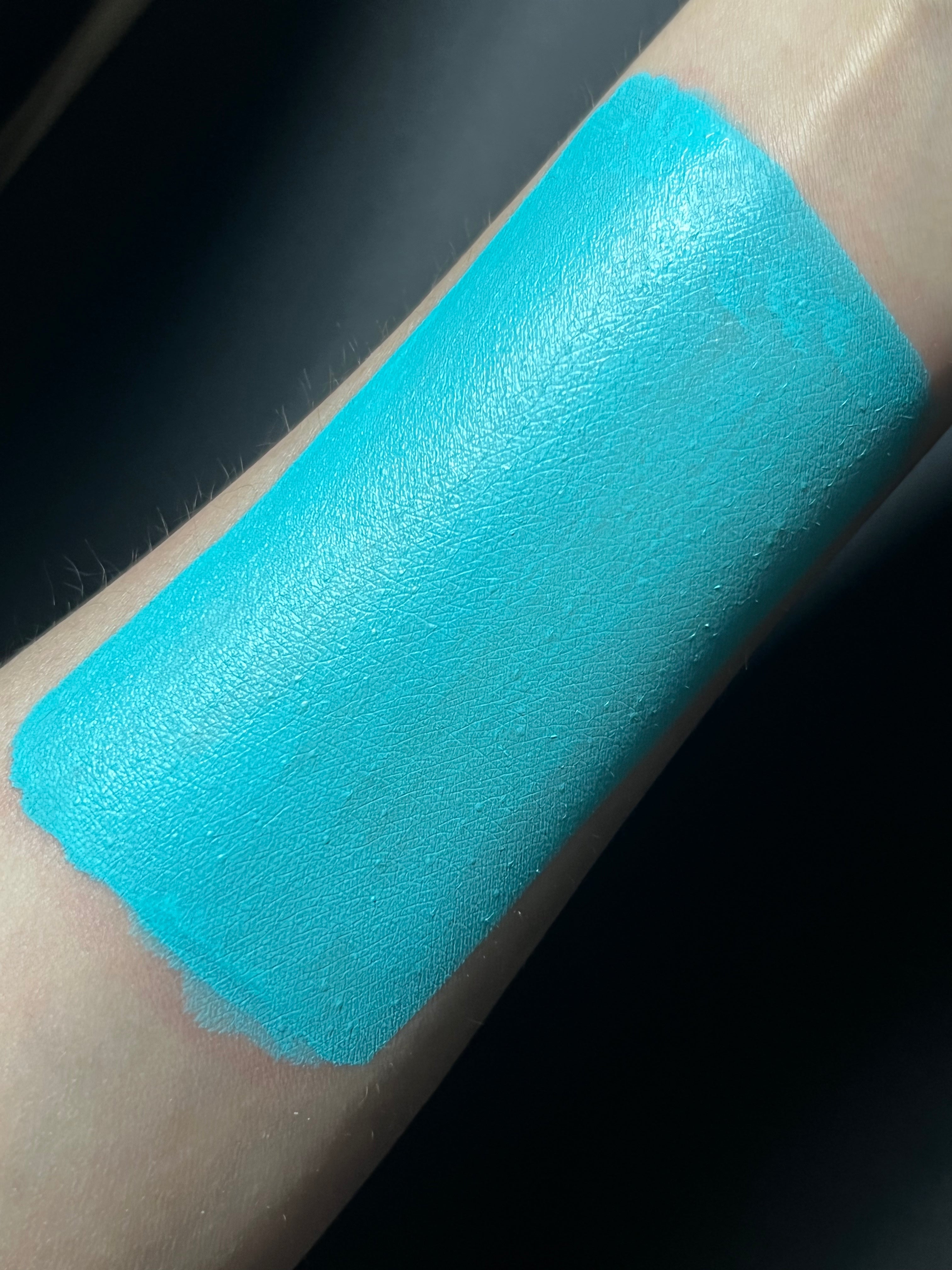 Nekoyanin 46 Teal Blue Water Activated Graphic Liner with bold, colorful design and water-activated ink on a plain background.