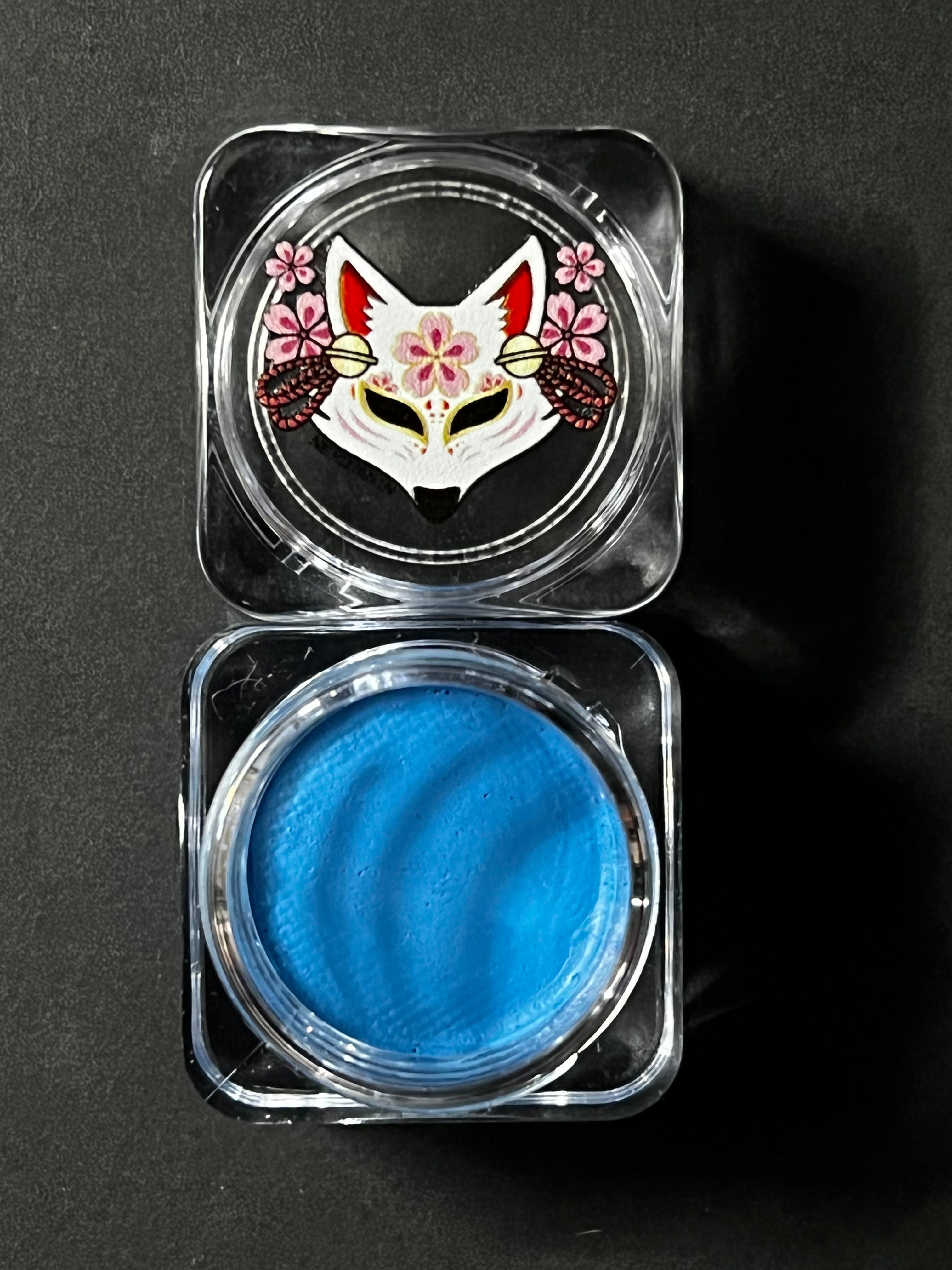 Blue water-activated graphic liner by Nekoyanin, featuring vibrant sky blue design for eye makeup artistry.