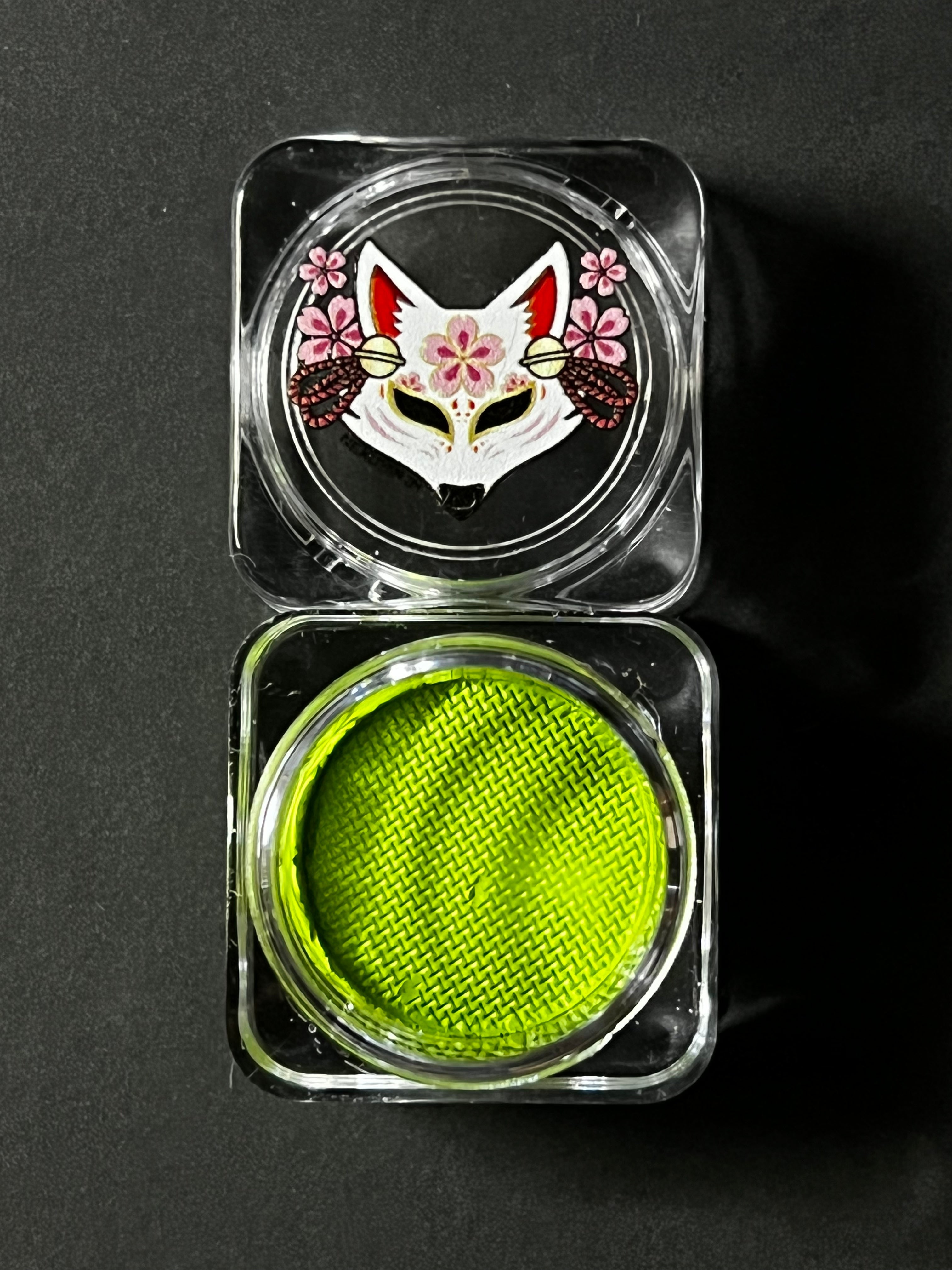 Nekoyanin 48 Lime Green Water Activated Graphic Liner with vibrant green gel formula and artistic design.