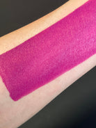 Fuchsia pink water-activated graphic eyeliner by Nekoyanin with bold, vibrant color and detailed design.