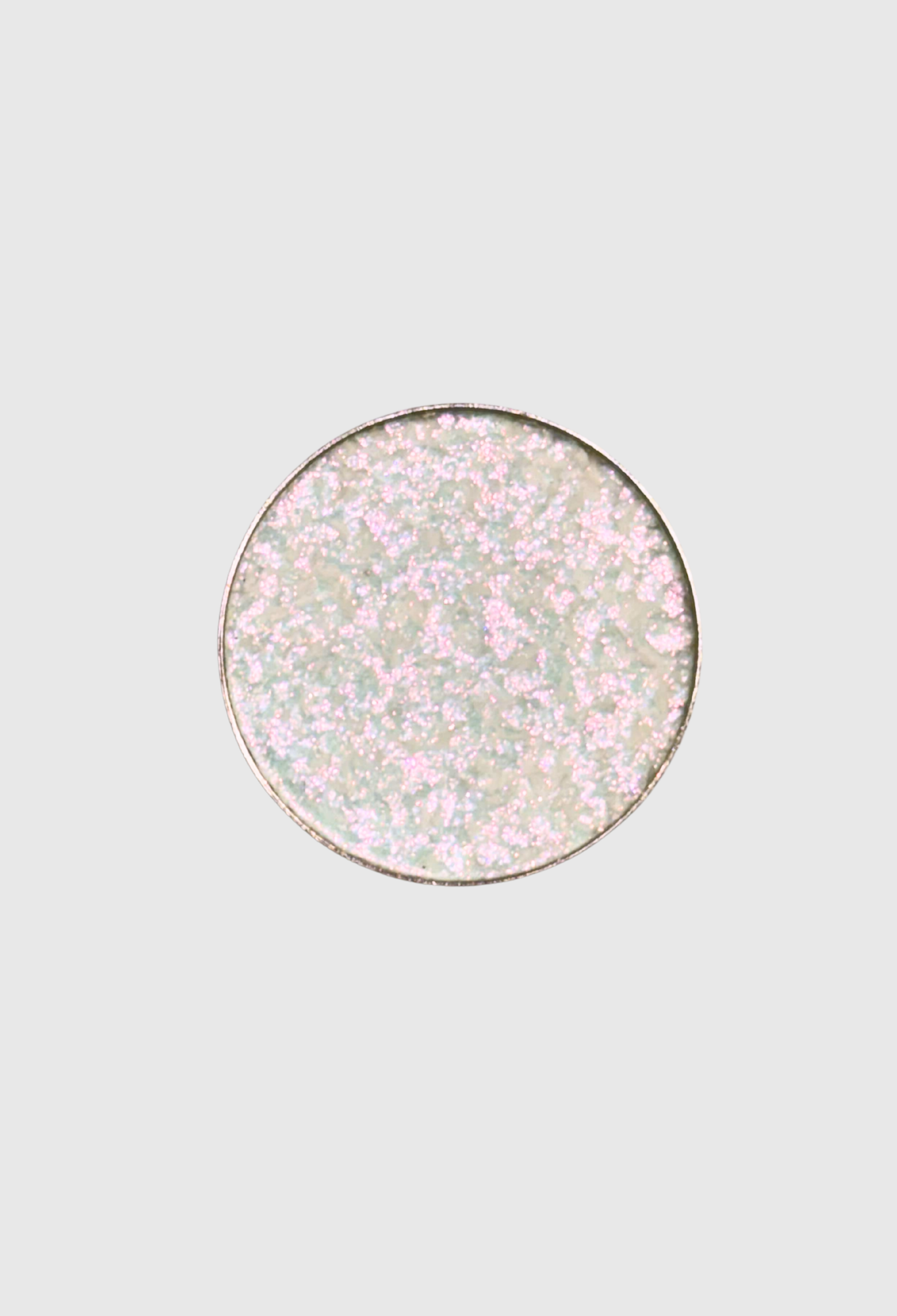 Nekoyanin Aura pressed pigment in a vibrant, finely milled cosmetic powder with colorful hues for eye or face makeup.