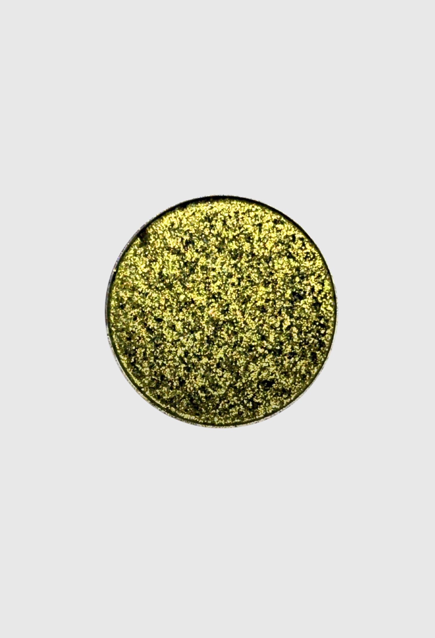 Nekoyanin Cloverlight pressed pigment in a compact container, showcasing vibrant, shimmery eyeshadow in natural light.