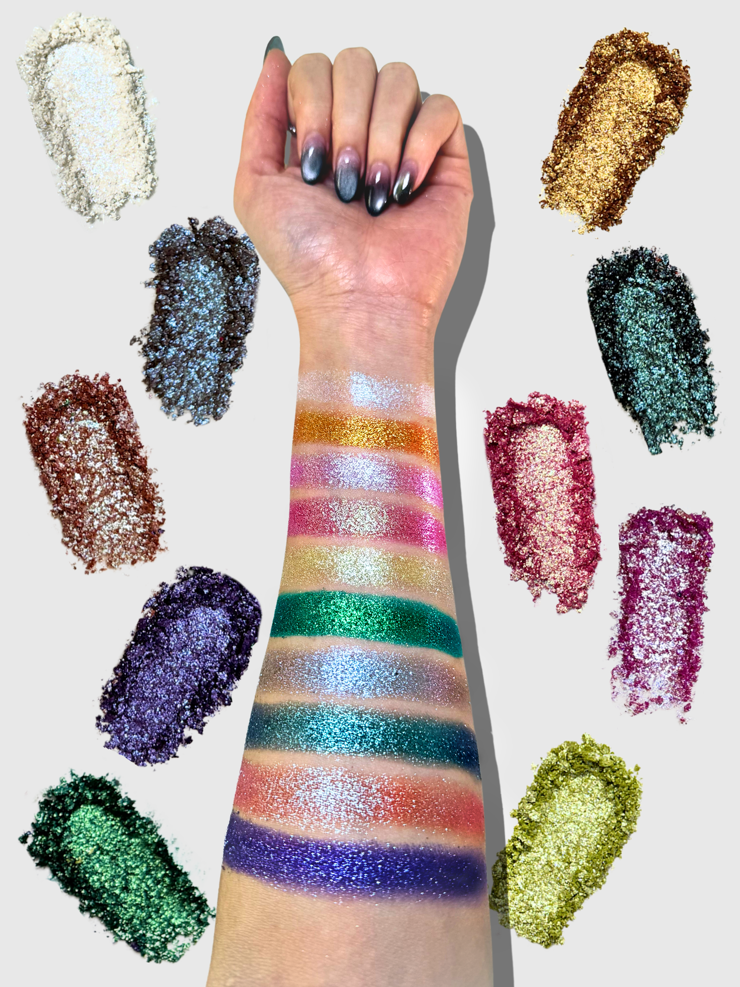 Nekoyanin Diamond of All Seasons duochrome pressed pigment palette with vibrant, shimmering eyeshadows in various colors.