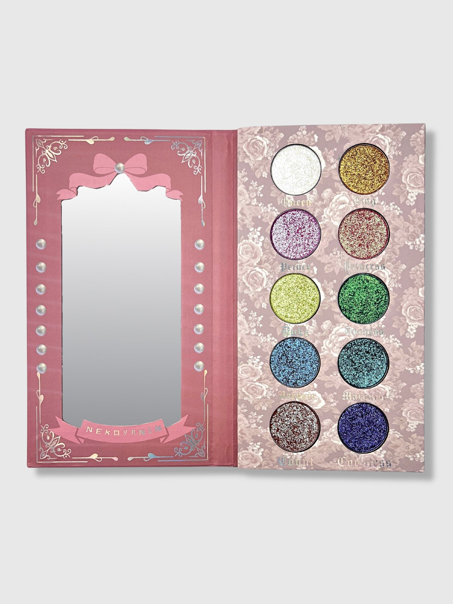 Nekoyanin Diamond of All Seasons duochrome pressed pigment palette with vibrant, shimmering eyeshadow shades in a sleek compact.