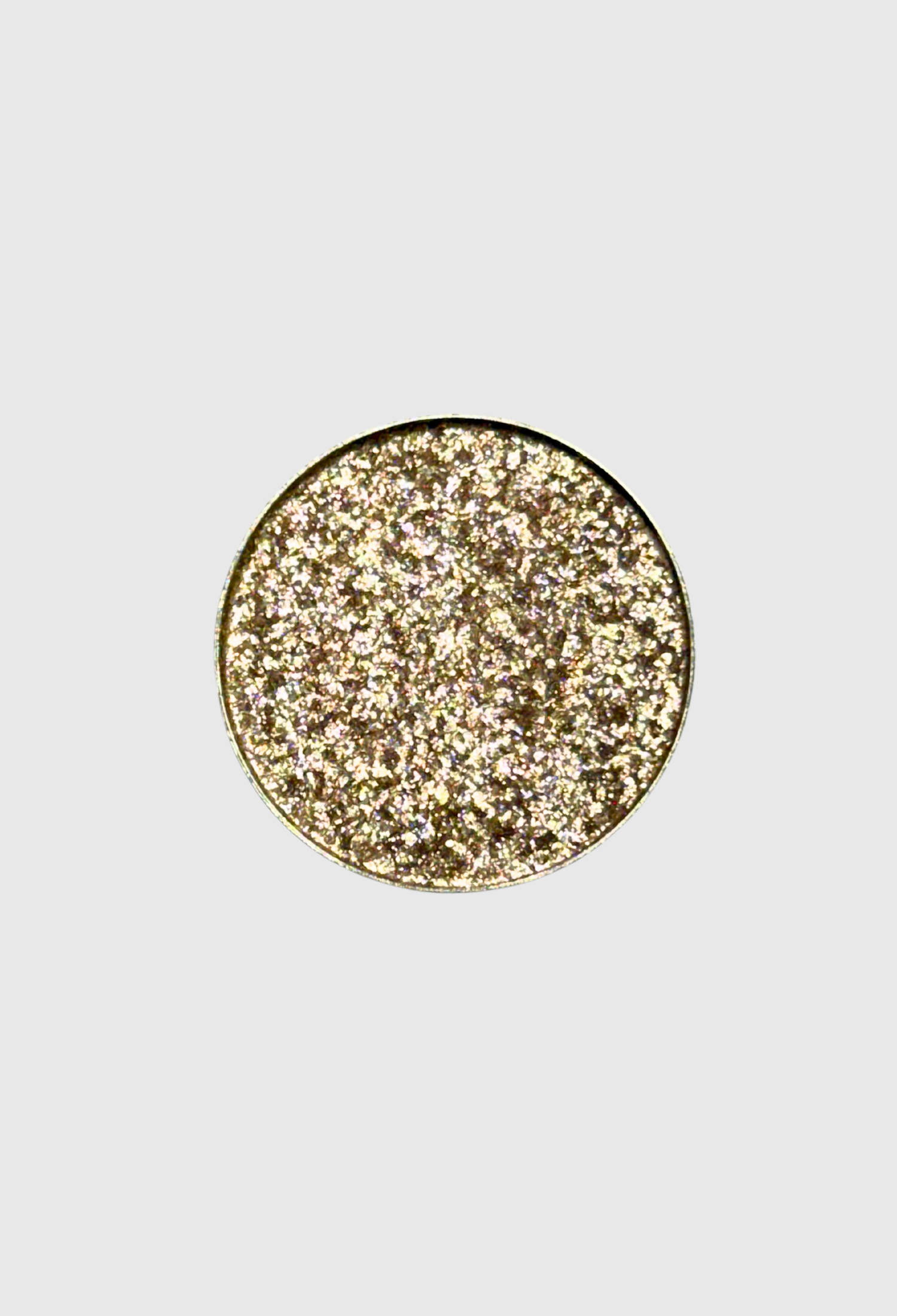Nekoyanin Excalibur pressed pigment in a compact with vibrant, shimmery blue and purple shades on a neutral background.