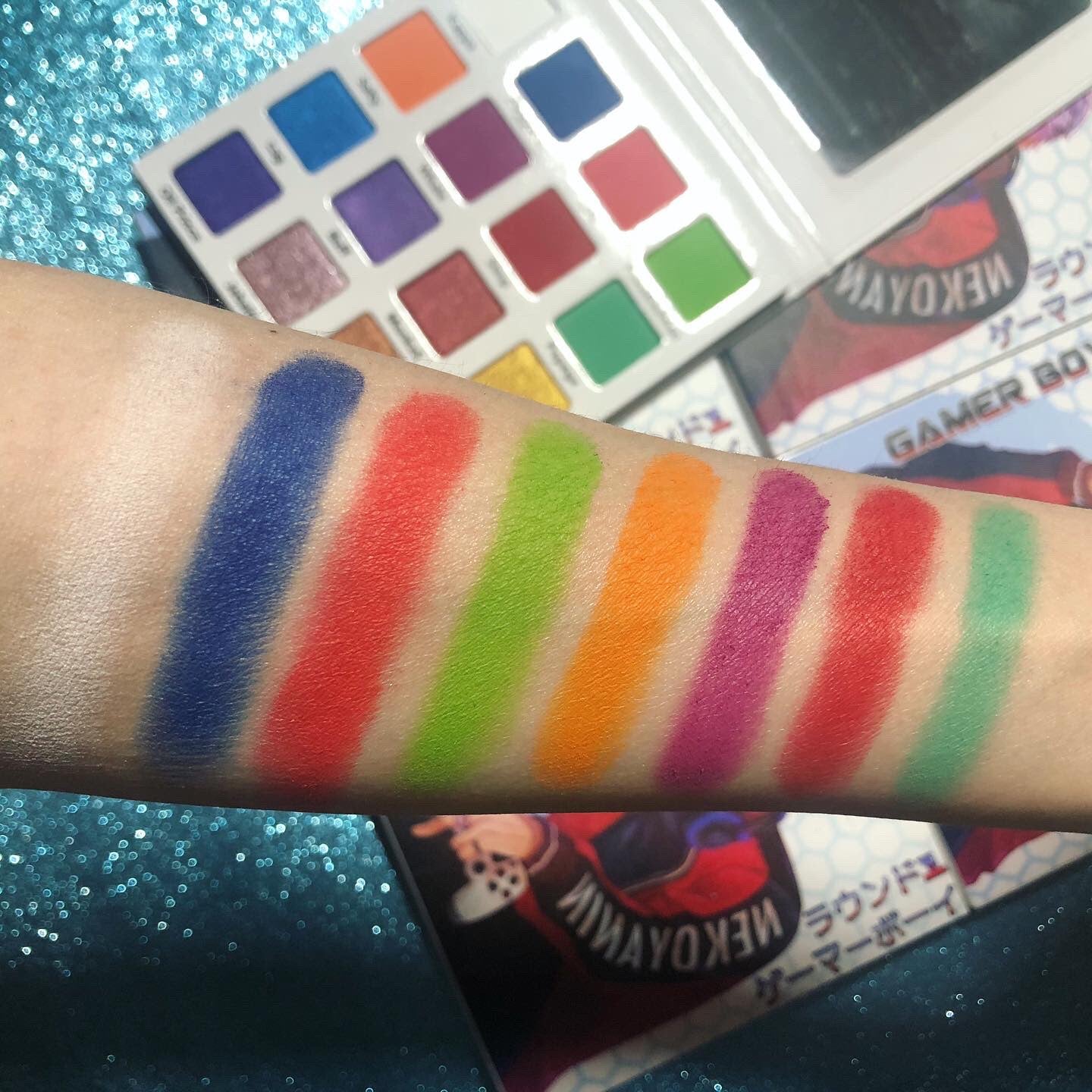 Nekoyanin Gamer Boy Palette featuring colorful eyeshadow shades in a compact palette for gaming-inspired makeup looks.