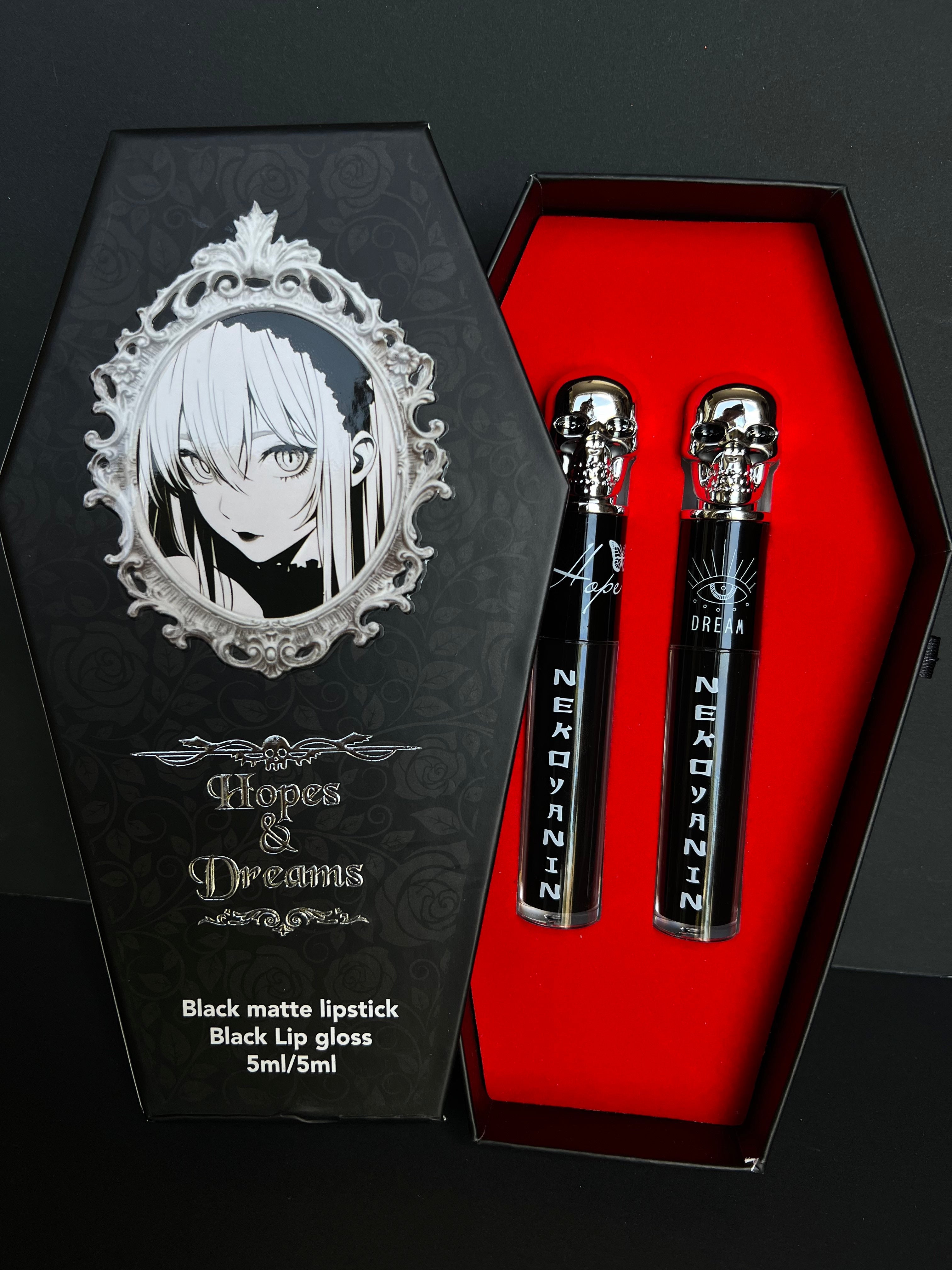 Nekoyanin Hopes and Dreams black liquid lipstick and lip gloss duo, featuring sleek black packaging and glossy finish