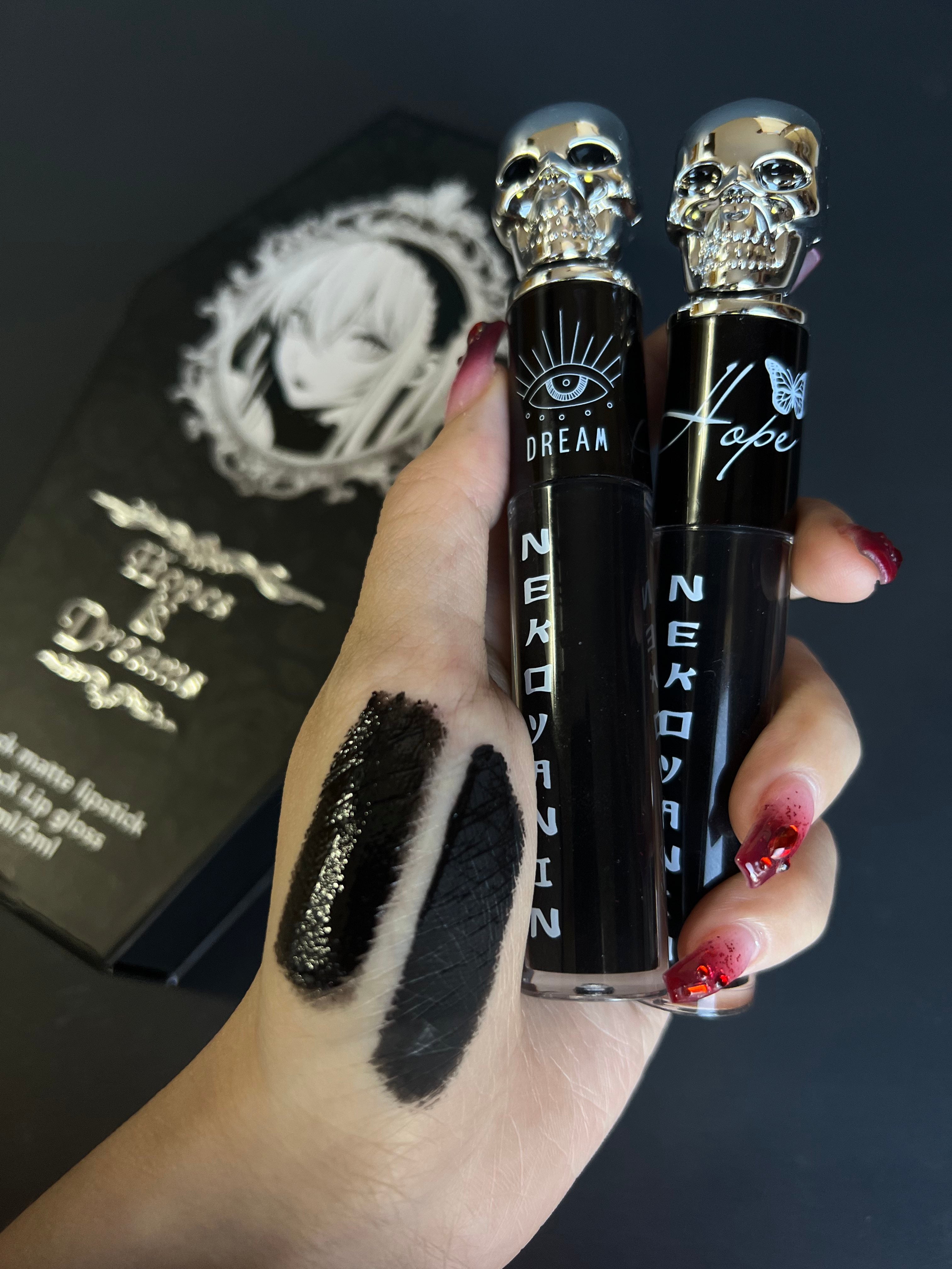 Nekoyanin Hopes and Dreams black liquid lipstick and lip gloss duo with applicators and shiny finish.