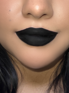 Nekoyanin Hopes and Dreams black liquid lipstick and lip gloss duo, featuring sleek black packaging and applicators.