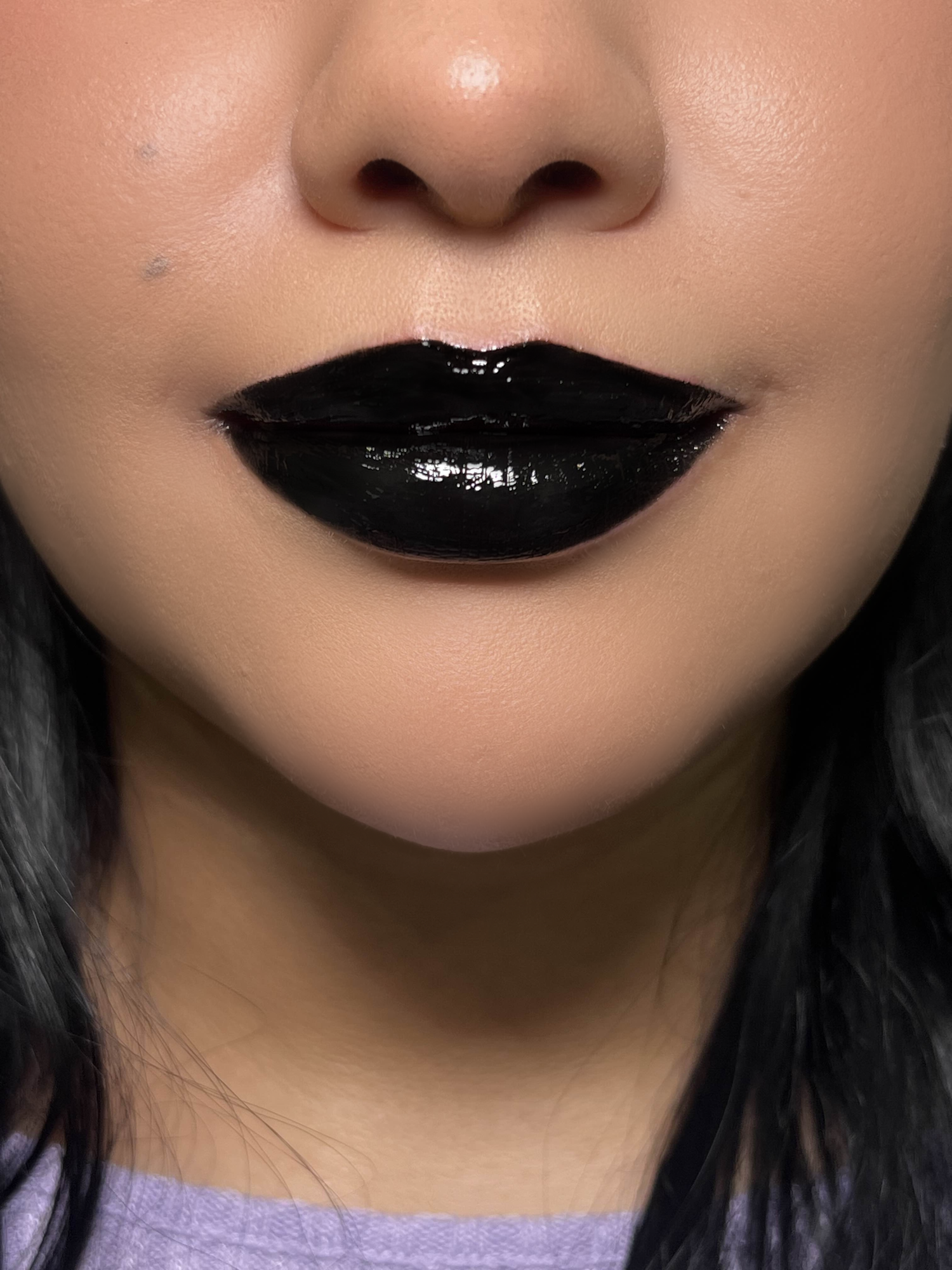 Nekoyanin Hopes and Dreams black liquid lipstick and lip gloss duo with sleek packaging and applicators visible.