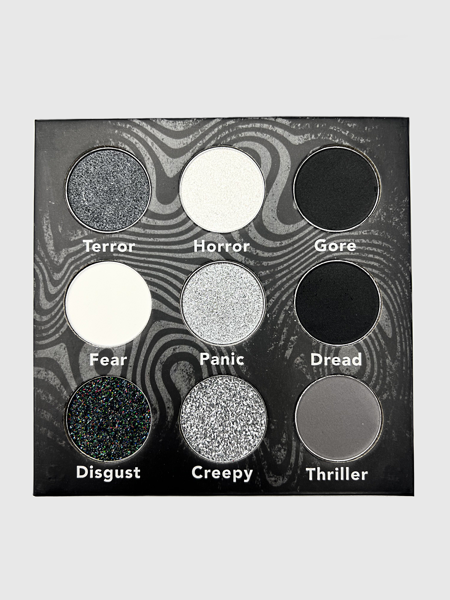 Japanese Horror Palette by Nekoyanin featuring vibrant, spooky eyeshadow shades in a compact palette.
