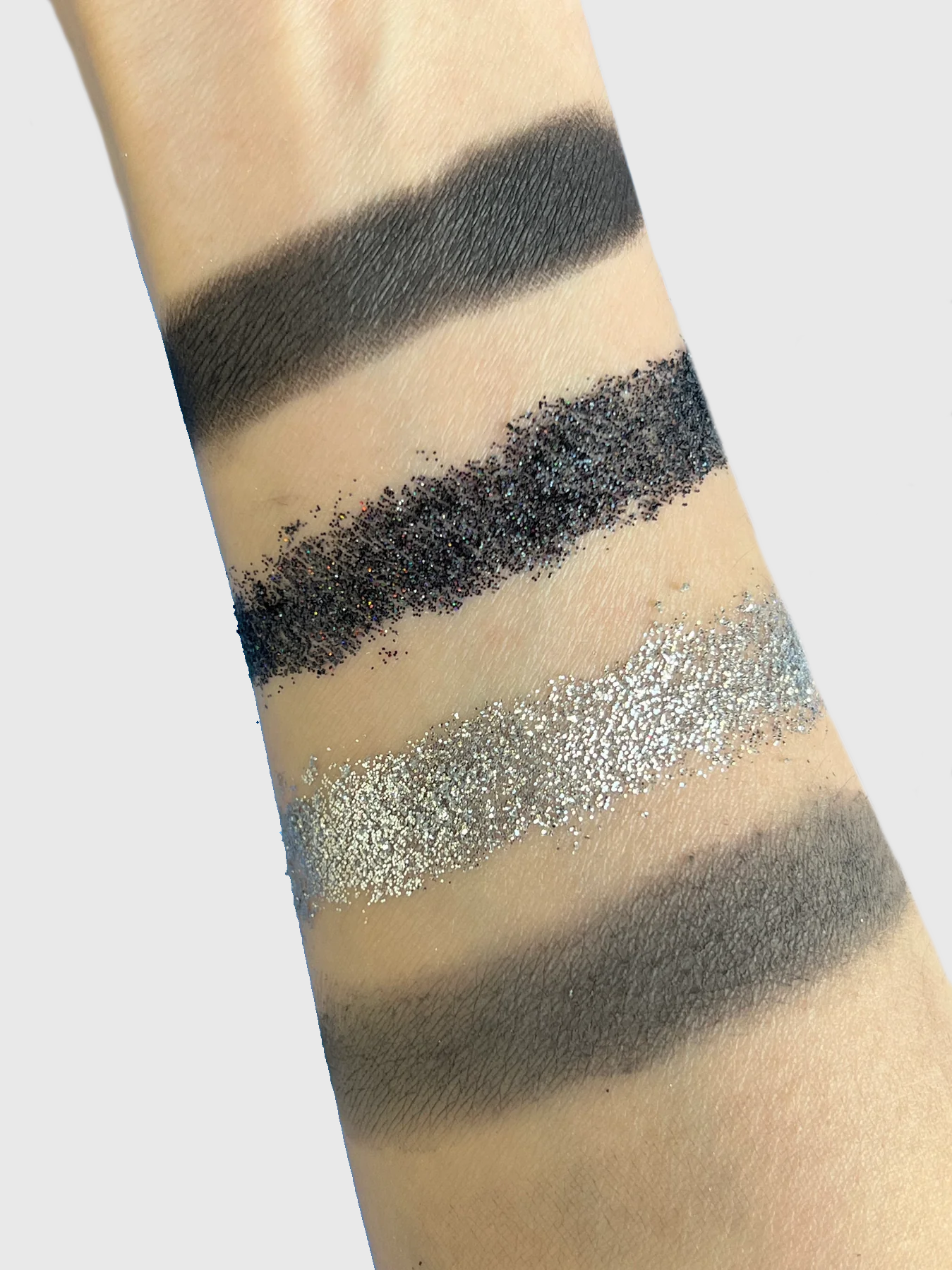 Nekoyanin Japanese Horror Palette featuring vibrant and dark eyeshadow shades inspired by Japanese horror themes.