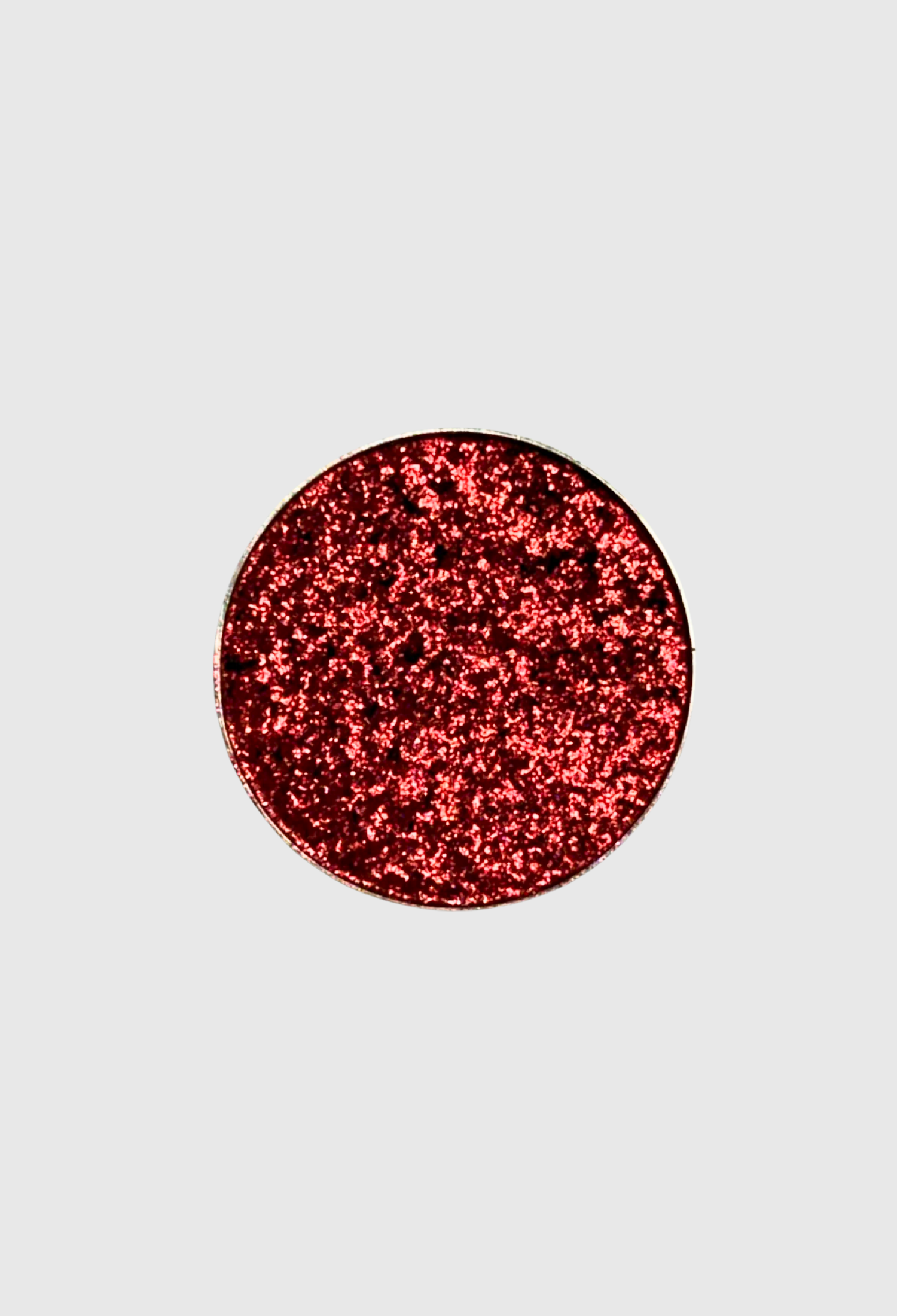 Pressed pigment in Steel Heart by Nekoyanin featuring a vibrant, shimmering eyeshadow shade with a metallic finish.