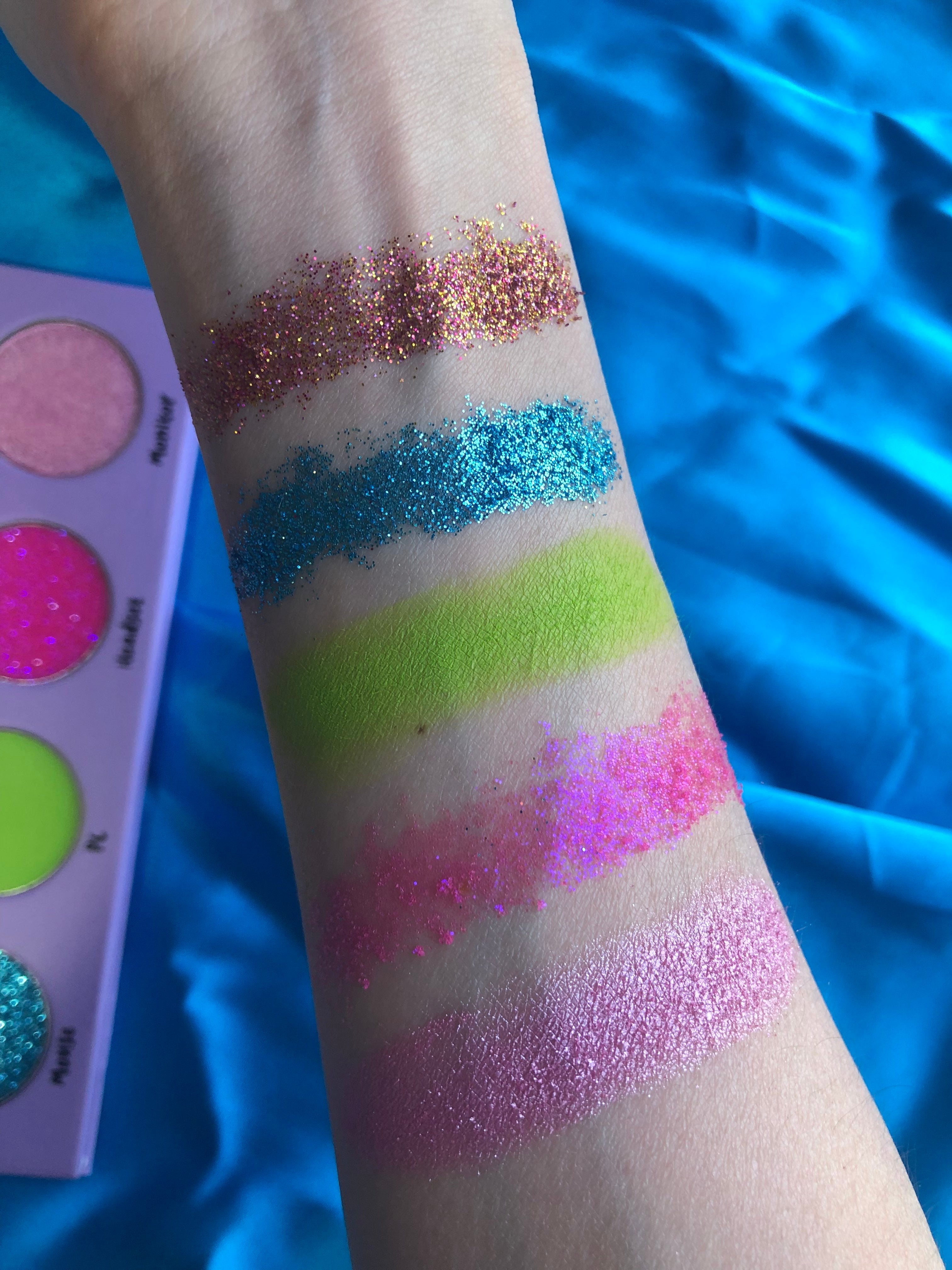 Nekoyanin Streamer Palette with vibrant, colorful makeup shades in a sleek compact case, perfect for creative eye looks.