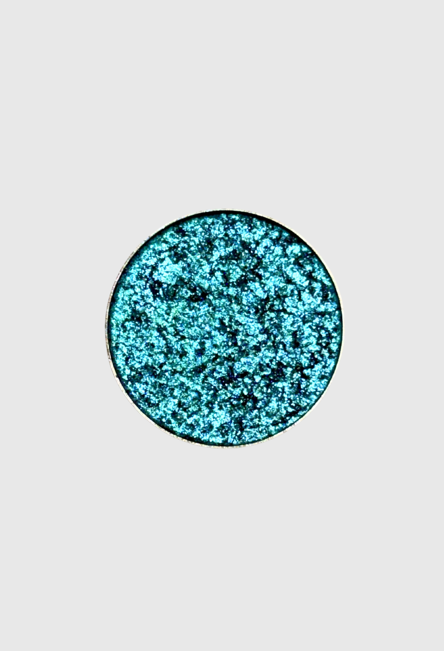 Nekoyanin Wishing Well pressed pigment eyeshadow in a vibrant, richly pigmented color with a smooth, velvety texture.