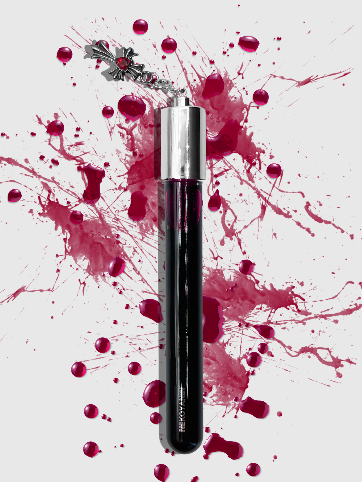 Nekoyanin Bloodline Lip Stain lip tint tube with deep red color, showcasing the sleek packaging and applicator.