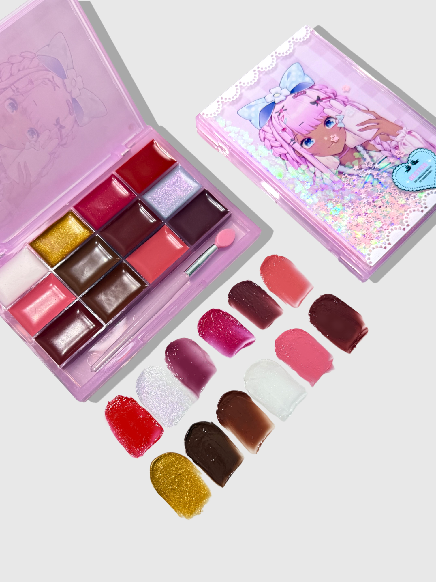 Nekoyanin Bestie Lipgloss Palette with pink shades, featuring multiple glosses in small circular containers arranged in a compact palette