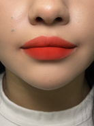 Nekoyanin Cupid Lip Mud in a jar, featuring a pink hue and heart-themed packaging, designed for moisturizing and tinting lips.