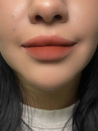 Close-up of Nekoyanin Cupid Lip Mud in a jar, showcasing the pink, creamy lip product with a smooth texture.