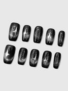 Nekoyanin Stargaze press-on nails featuring a celestial starry design on short, stylish acrylic nail tips.