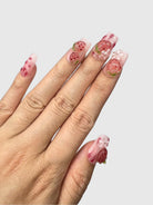 Nekoyanin Strawberry Shortcake press-on nails with pink and white design, featuring cute strawberry and shortcake motifs.