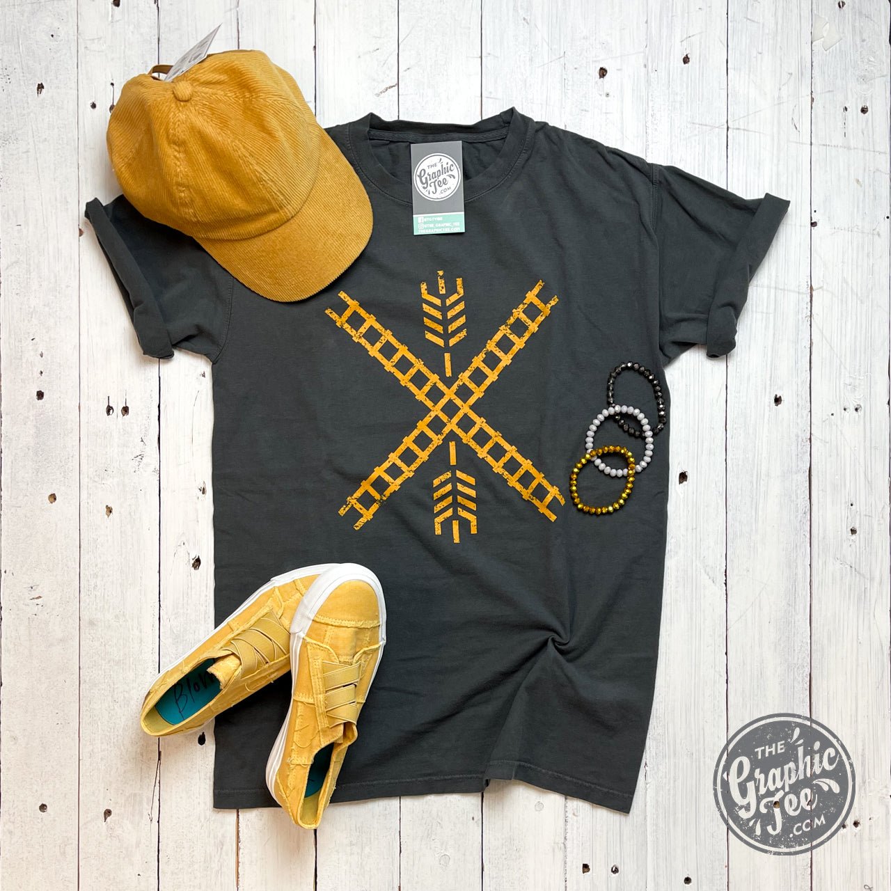 Unisex graphic tee by The Graphic Tee featuring a Newton Flag Comfort Wash design, soft cotton fabric, and casual fit.