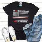 Unisex Not All Heroes Wear Capes graphic T-shirt by The Graphic Tee, featuring bold text and casual fit in a modern SS tee style.