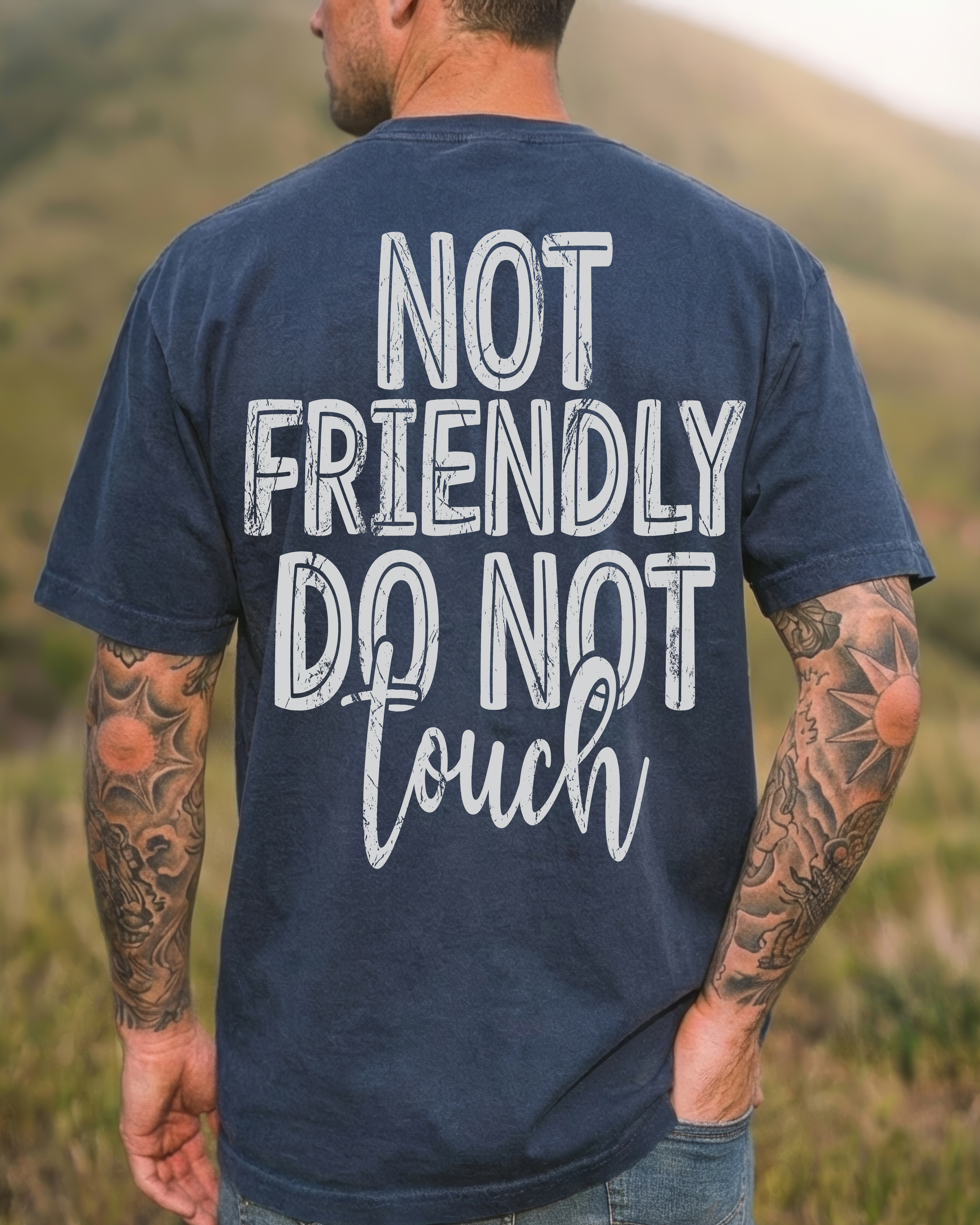 Black T-shirt from Shop Karma Tees featuring "Not Friendly. Do Not Touch" graphic print on the front.
