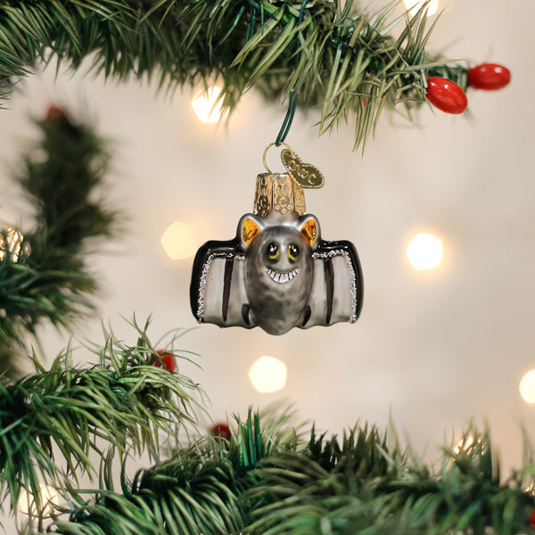Mini Bat Ornament by Old World Christmas featuring a detailed, handcrafted black bat with wings spread, ideal for holiday decor.