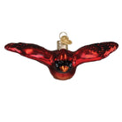 Old World Christmas Cardinal In Flight Ornament featuring a vibrant red cardinal bird in mid-flight with detailed feathers.