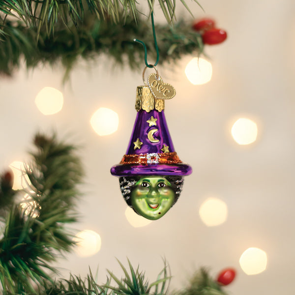 Mini Witch Head Ornament from Old World Christmas featuring a detailed witch face with a pointed hat and spooky expression.