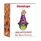 Mini witch head ornament by Old World Christmas featuring a detailed witch face with pointed hat and spooky Halloween design.