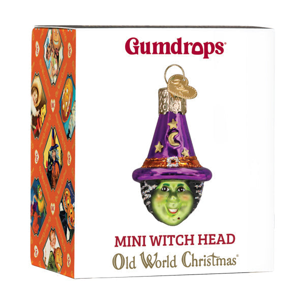 Mini witch head ornament by Old World Christmas featuring a detailed witch face with pointed hat and spooky Halloween design.
