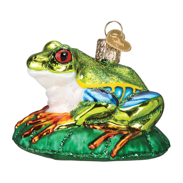Red-eyed Tree Frog ornament by Old World Christmas, featuring vibrant green body and striking red eyes, detailed and realistic.