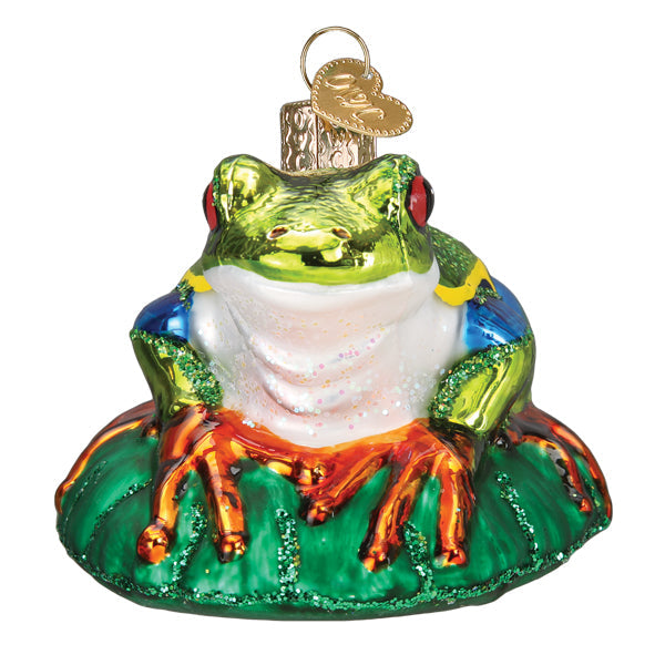 Red-eyed Tree Frog ornament from Old World Christmas, featuring vibrant green body and striking red eyes, detailed festive decor.