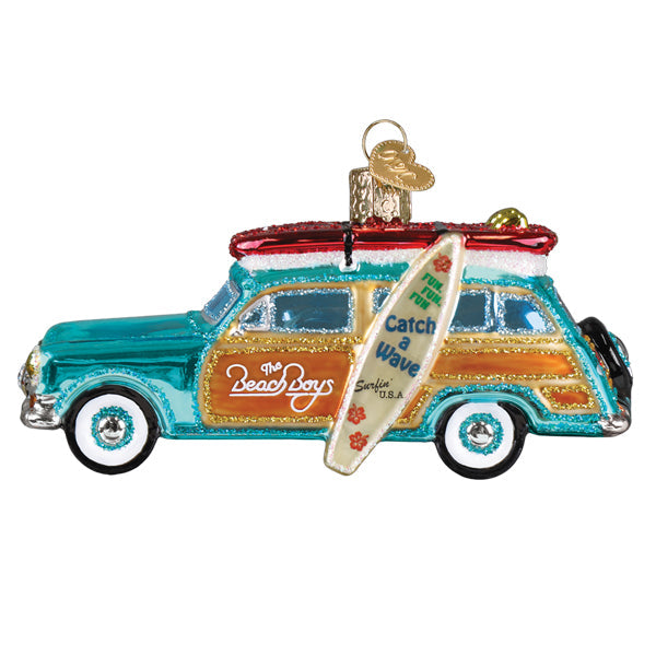 Old World Christmas Surfin' Woody ornament featuring a vintage-style surfer figure in a wood finish design.