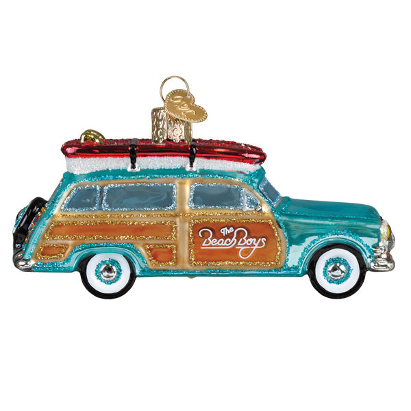 Old World Christmas Surfin' Woody ornament featuring a vintage-style surfer character with a surfboard, detailed and festive.