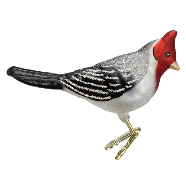Red-crested cardinal ornament by Old World Christmas, featuring a vibrant red bird with detailed feathers and festive design.