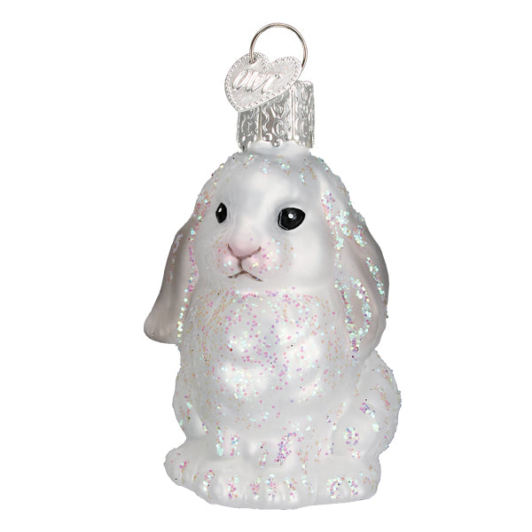 White Baby Bunny ornament from Old World Christmas, featuring a detailed ceramic bunny with a festive design.