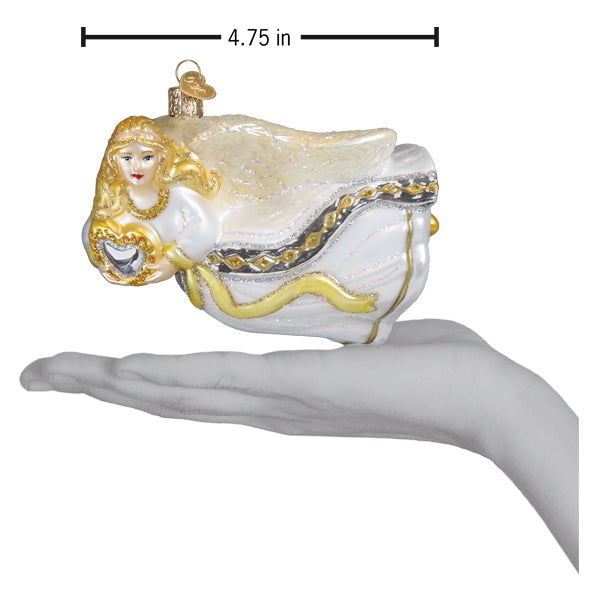 Colorful angel with a heart ornament from Old World Christmas featuring intricate glass design and festive holiday details.