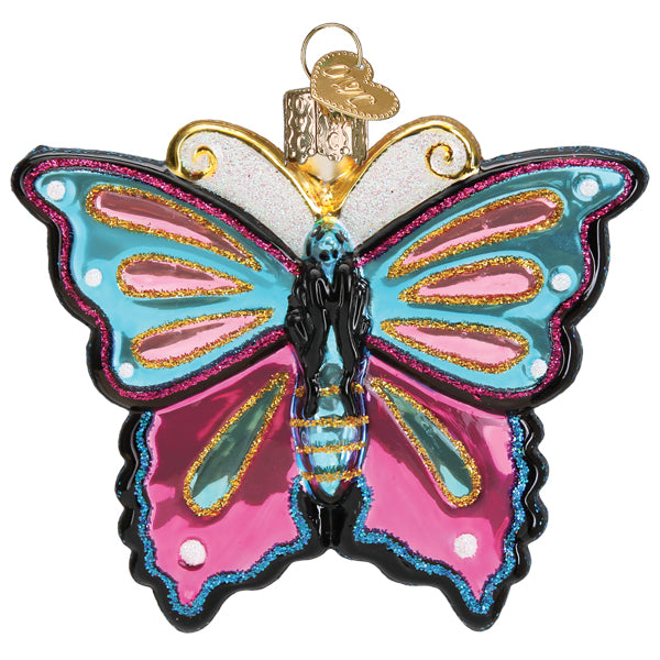 Colorful glass butterfly ornament from Old World Christmas with intricate designs on transparent wing segments.