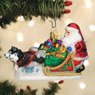 Santa's dog sled ornament by Old World Christmas features a festive dog pulling a sleigh, detailed holiday décor for Christmas trees.